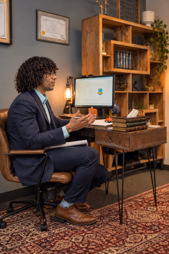 Jose De La Cruz in a private office consultation at Revibe Therapy
