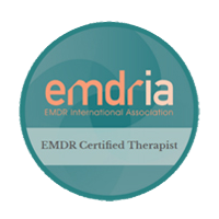 A circular badge with the text "emdria EMDR International Association" at the top and "EMDR Certified Therapist" on a banner at the bottom. The badge has a teal gradient background.