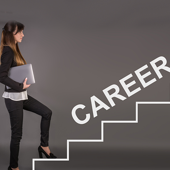 A woman holding a laptop climbs white, graphical stairs on a gray background. The word "CAREER" is prominently displayed along the stairs, conveying the concept of career advancement. She is dressed in professional attire.